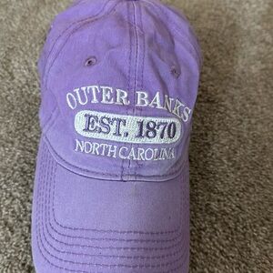 purple baseball cap